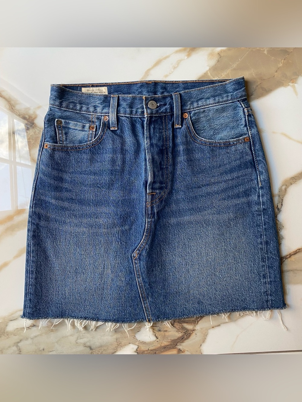 Levi's High Rise Deconstructed Skirt in Medium Wash W/Distressed Hem - Size 26